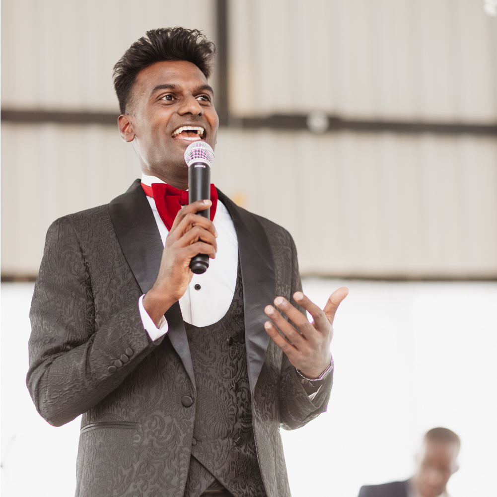 Wesley Chetty speaking at a mid-sized event